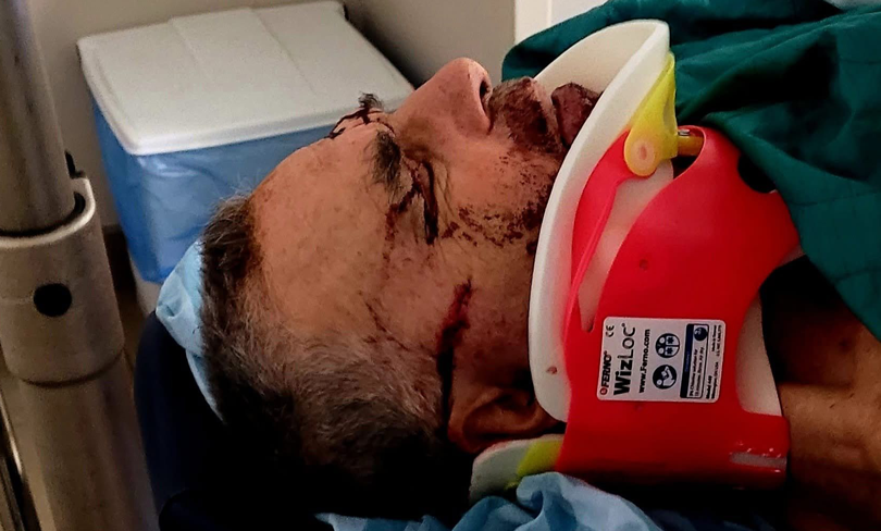 Activist Oded Yedaya on a stretcher after being injured by settlers